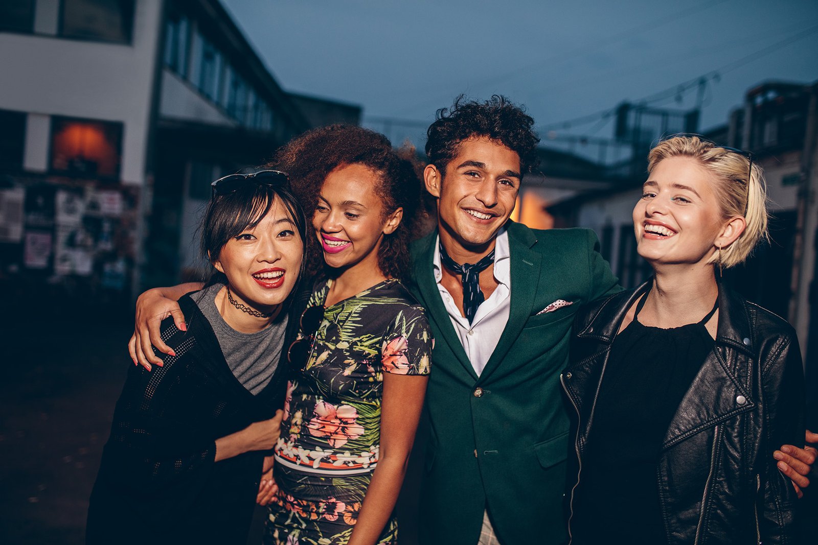 Event Photography Photo of a diverse group of friends in their early twenties at evening