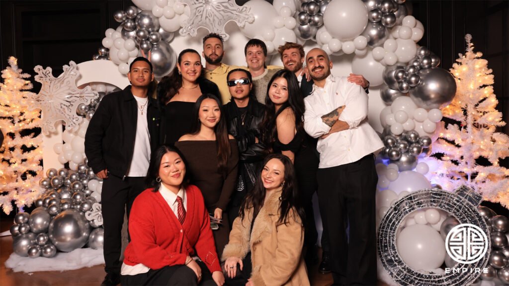 EMPIRE Records holiday party photo booth setup in San Francisco with branded winter backdrop
