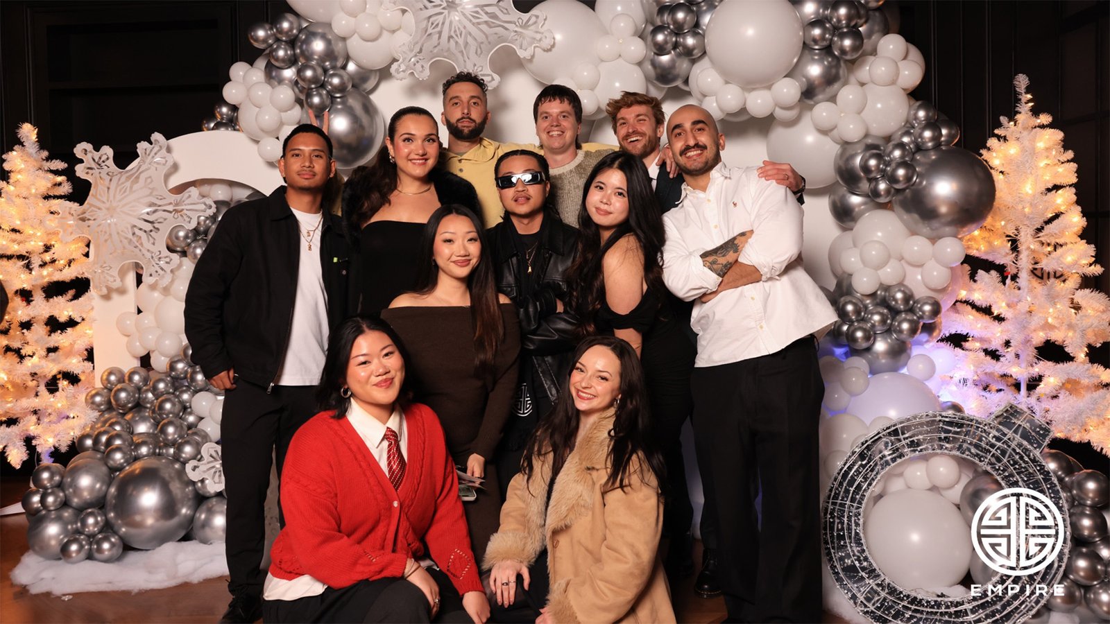 EMPIRE Records holiday party photo booth setup in San Francisco with branded winter backdrop