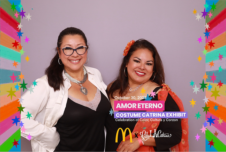 Two women at costume exhibit event