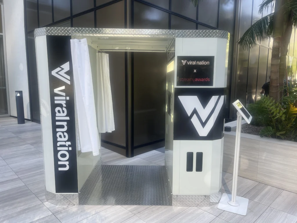 Photo booth with branding and curtains
