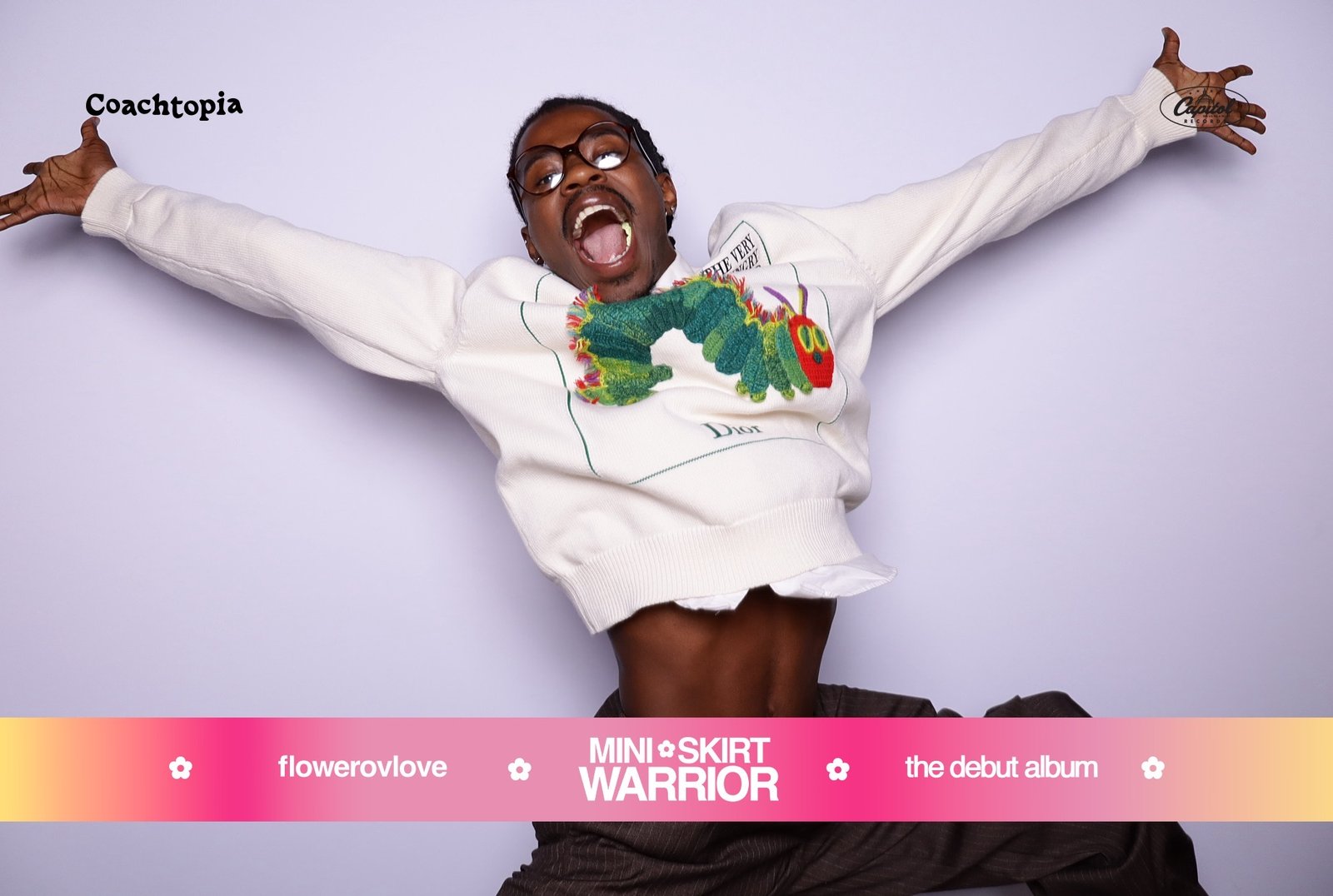 Guest jumping mid-air in a branded studio photo booth at BLT Studios, Los Angeles